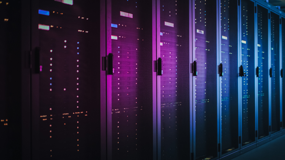 Shot,Of,Dark,Data,Center,With,Multiple,Rows,Of,Fully